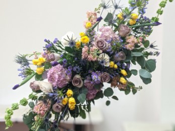 Purple and yellow floral arrangement
